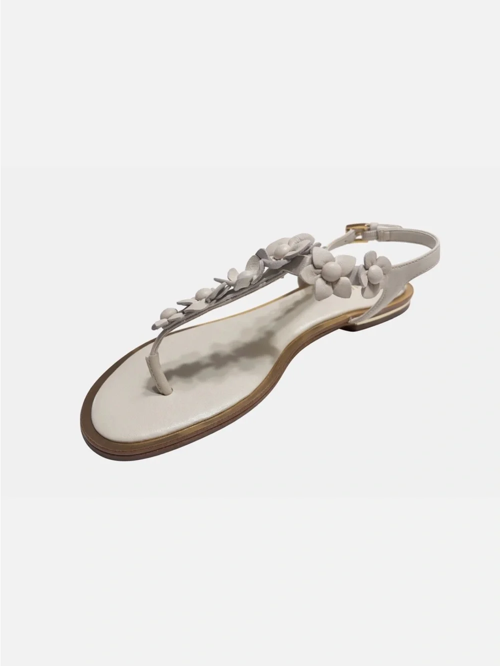 Michael Kors “Tricia” White Floral T-Strap Sandal with Gold Trim